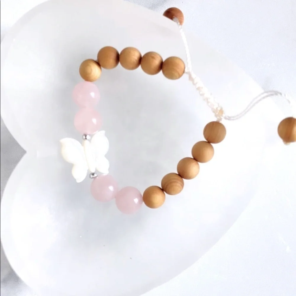 A rose Quartz and butterfly kid’s bracelet